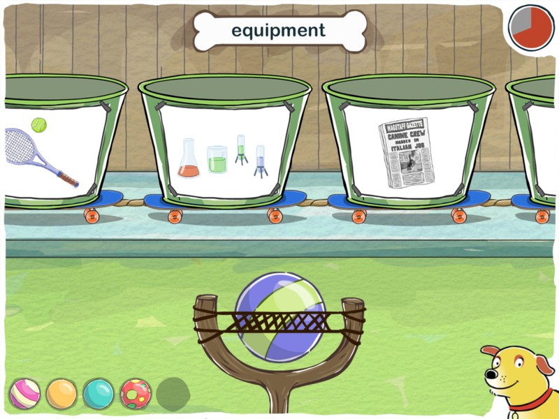 An app screen featuring buckets on top of skateboards in a row, each bucket has an image on it: a tennis racket, beakers and a newspaper. There is a slingshot interface in the foreground with a ball in it ready to shoot. There's a bone at the top of the screen with a word in it that reads, “equipment.”