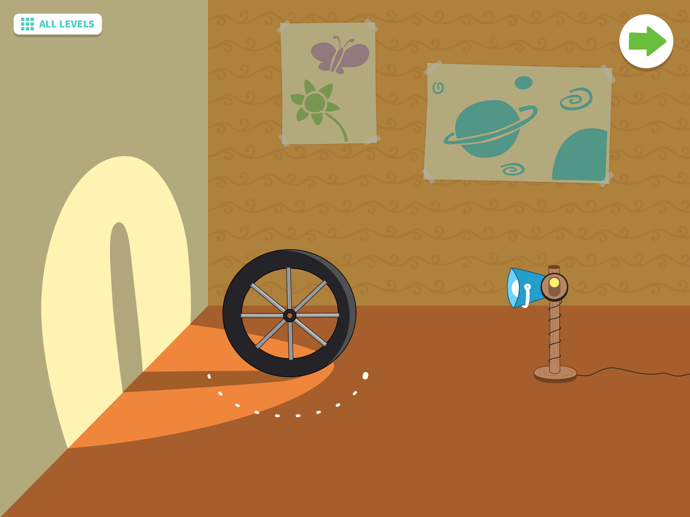 A game screen with an animation of a bike wheel turning while creating different shadow shapes on the wall.